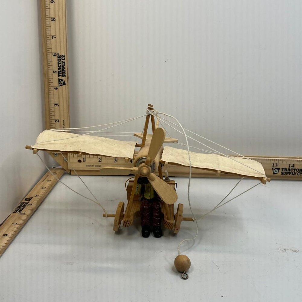 Vintage Wooden Flying Machine with Pilot Toy Handcrafted Airplane Propeller